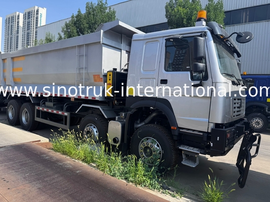 SINOTRUK HOWO 371HP 8X4 ট্যাপার ডাম্প ট্রাক নির্মাণ পুরানো সামনের মুখ সামরিক বাম্পার জন্য খনির এলাকায় দুটি সতর্কতা লাইট ইউ টাইপ কনটেইনার
